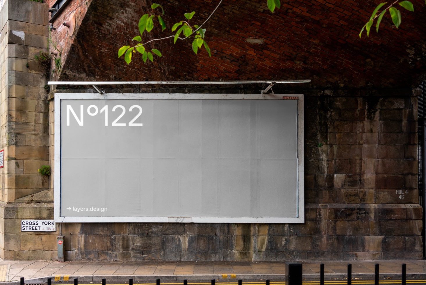 Urban billboard mockup on a brick wall for outdoor advertising graphic design templates.