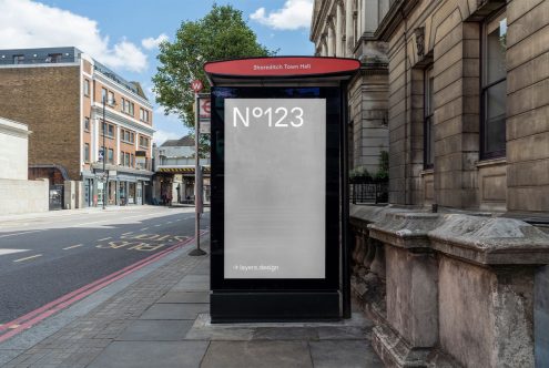 Urban bus stop billboard mockup at Shoreditch Town Hall, clear day for outdoor advertising and poster design presentations.