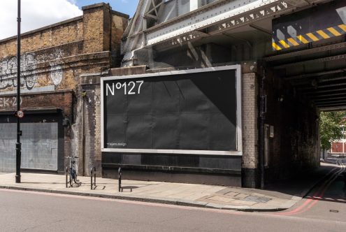 Urban billboard mockup under a railway bridge for outdoor advertising, realistic street setting with textures, suitable for designers.