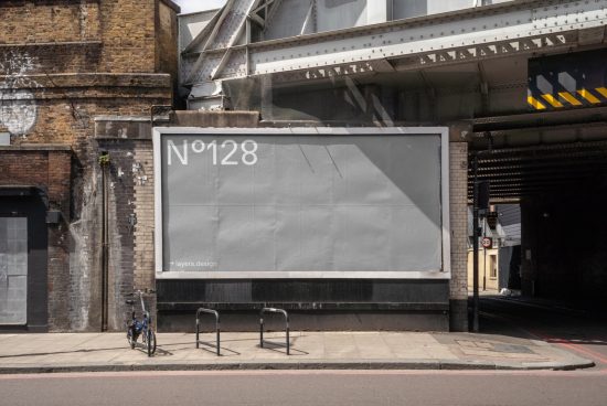 Urban billboard mockup on street wall under bridge, ideal for designers to showcase advertisement designs, clear and editable template.