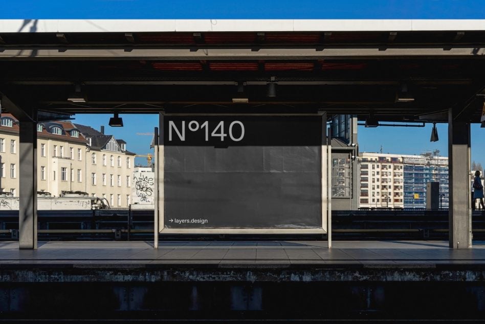 Dark storefront banner N°140 on modern train platform with city views