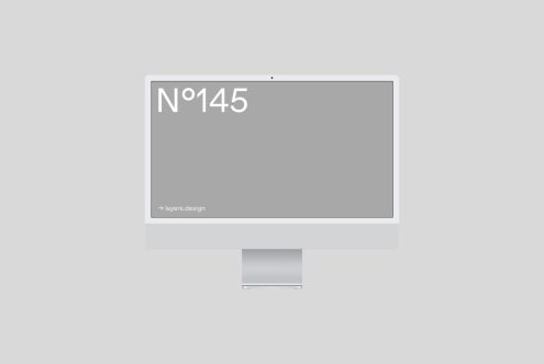 Minimal computer monitor mockup design template with blank screen on a gray background, ideal for website interface presentation.