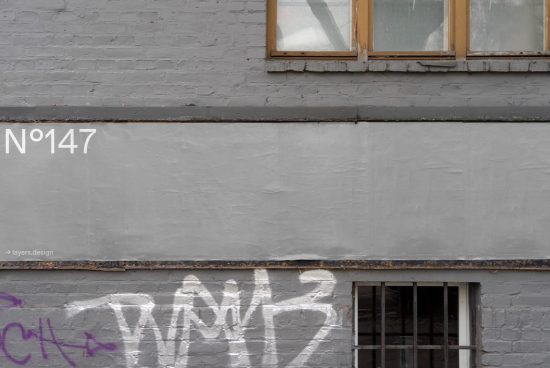 Urban brick wall texture with graffiti and number 1947 for background mockup design, featuring gray tones and window details.