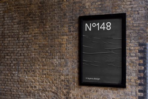 Modern poster mockup on brick wall background, showcasing textured design for graphics display in urban setting, ideal for designers presentations.