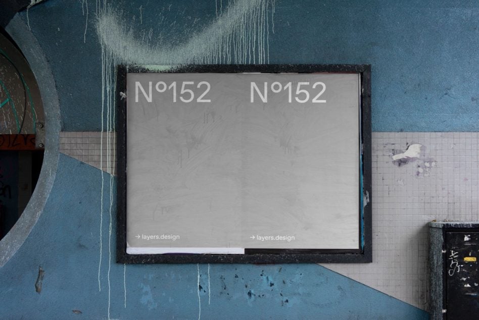Double lightbox display N°152 on turquoise painted wall with graffiti
