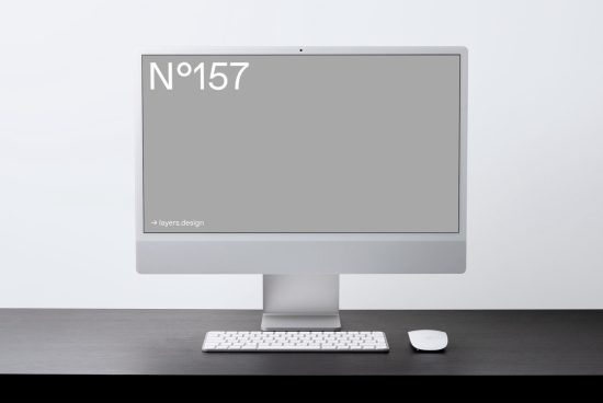 Sleek modern computer mockup on desk with keyboard and mouse, minimalist design for digital asset showcasing, ideal for graphic and template display.