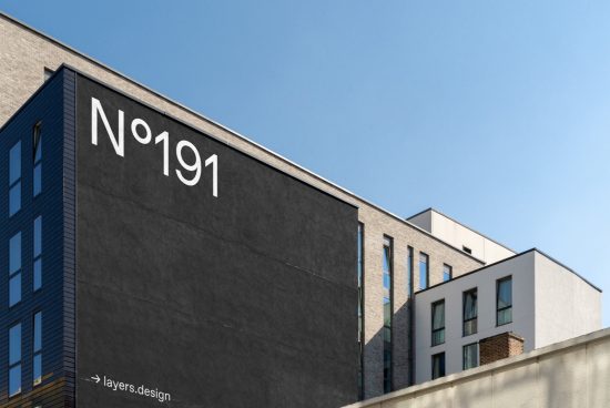 Modern building facade with minimalist typography No191 for architecture mockup, clear blue sky, urban design template.