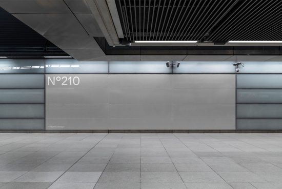 Modern urban subway station wall with sleek metal panel design, tiled floor, and lighting fixtures for architectural mockup.