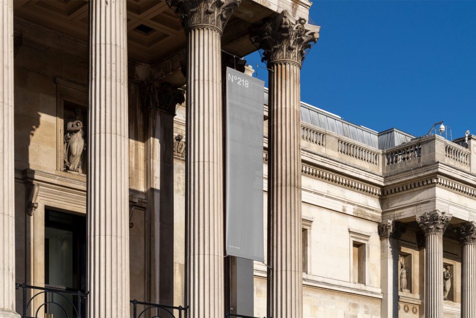 Classical architecture with columns and a blank banner mockup for design presentation, ideal for graphics and templates display.