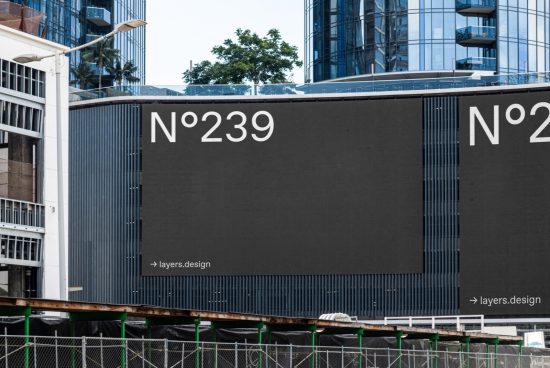 Urban billboard mockup with bold typography showcasing a stylish font, ideal for outdoor advertising graphics in a modern city environment.