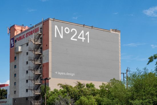 Urban mockup with large building side number typography design, clear sky, potential for billboard advertising space display for designers.