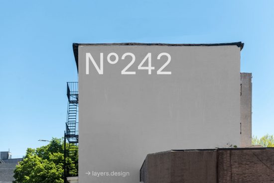 Urban building mockup featuring large wall space with number 242 in a bold font, ideal for outdoor branding presentation.