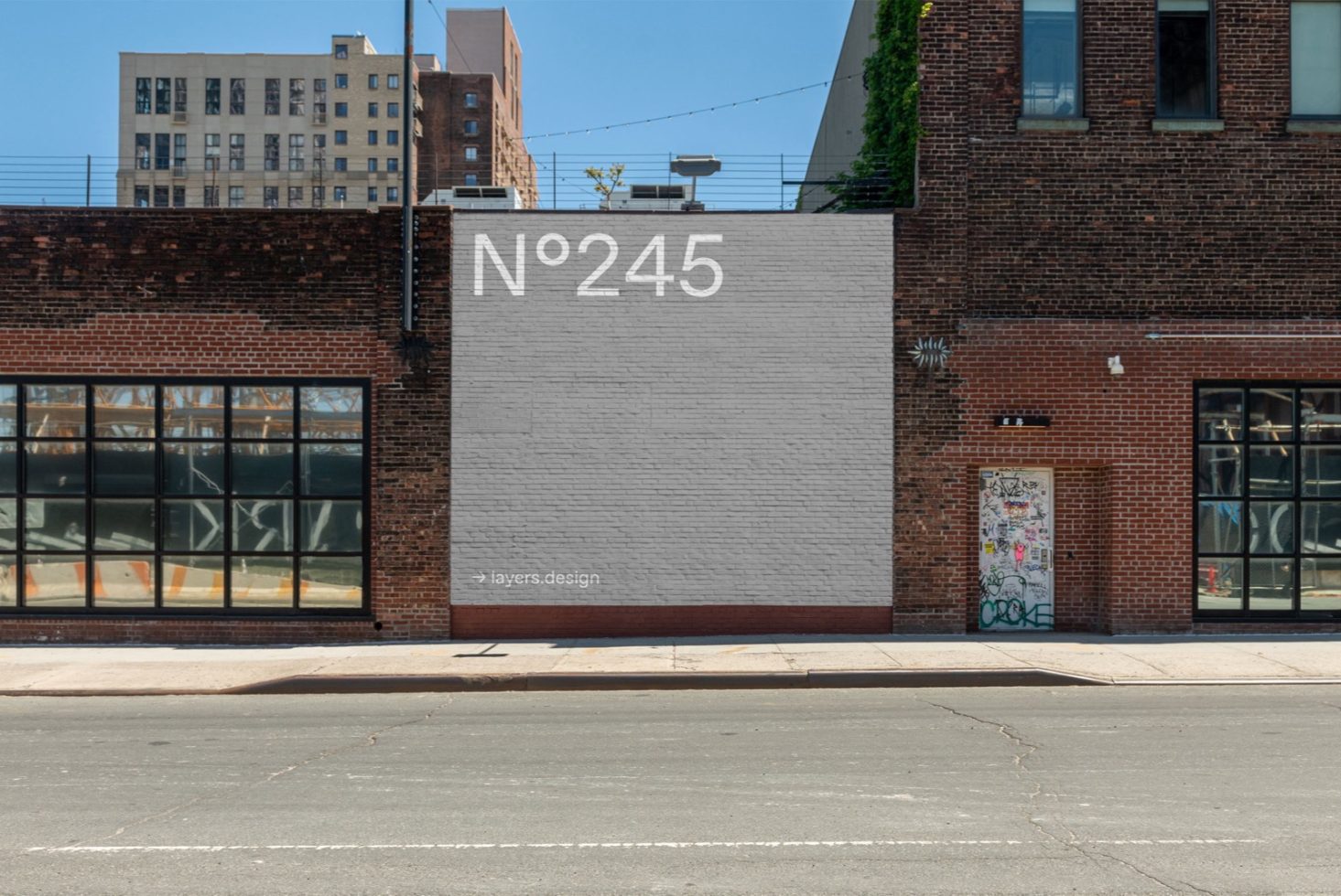 Urban building wall mockup for displaying logo or signage in a realistic street environment, perfect for designers, branding visuals.