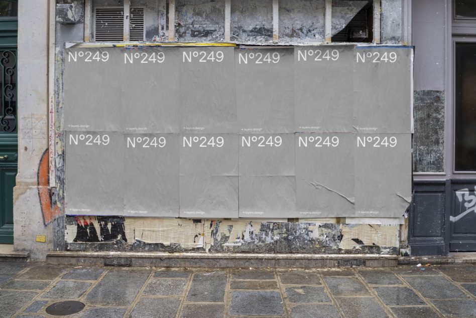 Large outdoor billboard mockup with repeating N°249 labels on weathered facade