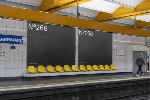 Modern subway station interior mockup with yellow seats, large advertising spaces, and blurred walking person, ideal for urban design presentations.