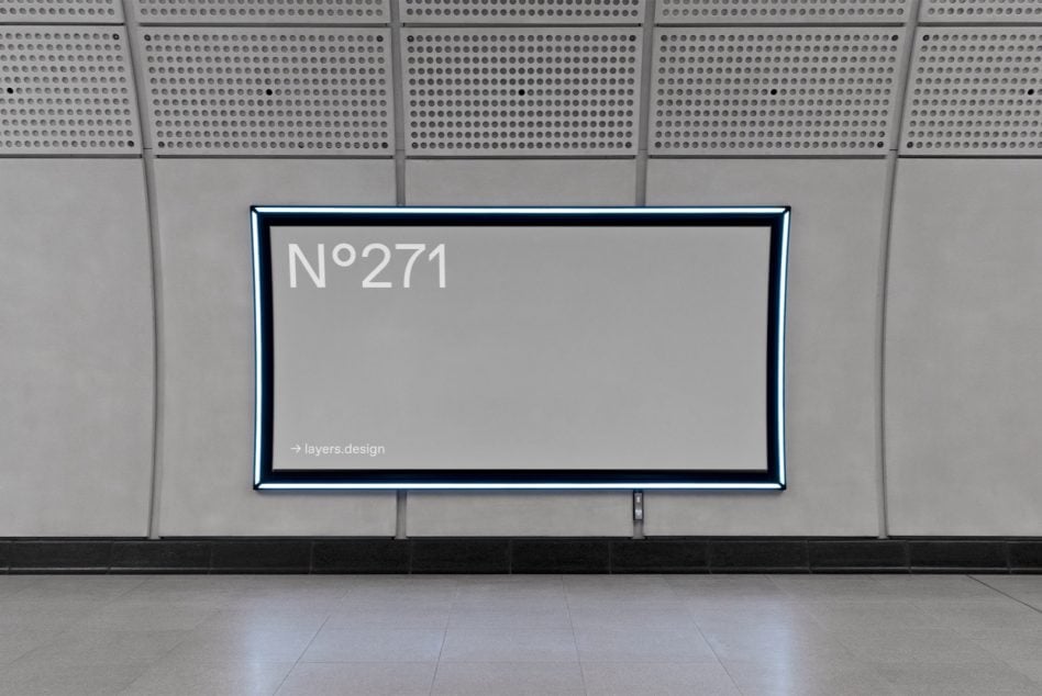Wide storefront with blue neon border sign showing N°271 on textured wall
