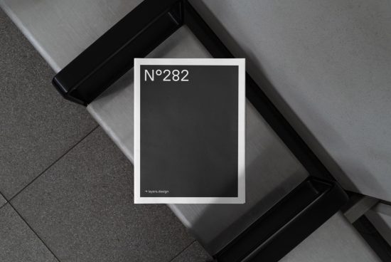 Magazine mockup on metal stairs, minimalist design, editable PSD for presentation, clean and modern for portfolio display.