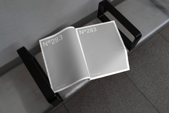 Open magazine mockup design on bench with blank pages for graphic display, clean and modern styling for publishing and advertising.