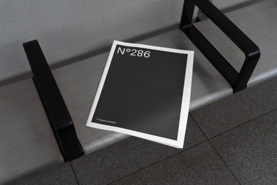 Elegant minimalist poster mockup on metallic bench, urban setting for showcasing design work, sleek and modern.Mockups category for designers.