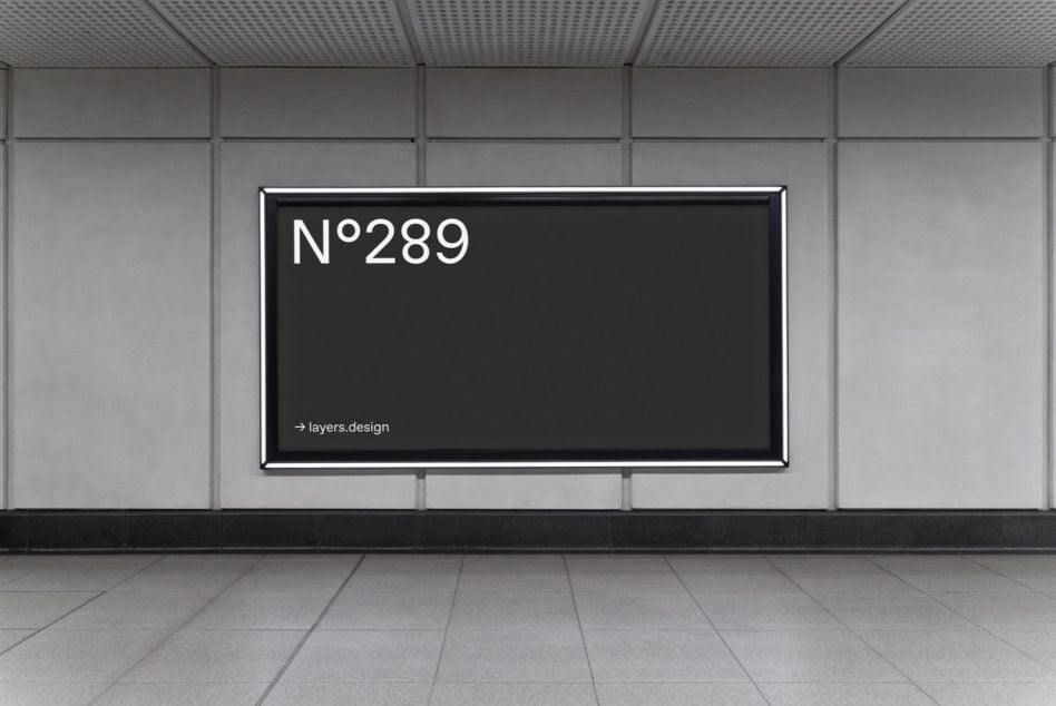 Dark horizontal screen mounted in minimalist office corridor