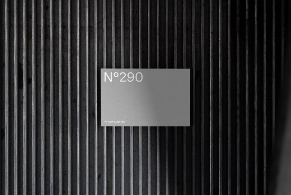 Elegant card mockup with N°290 text set against a textured metal ribbed surface, ideal for designers to showcase branding.