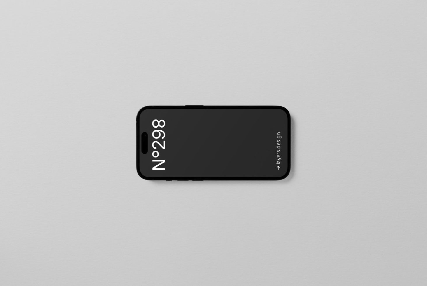 Smartphone mockup lying on a plain surface with modern, minimalistic style, ideal for showcasing mobile app and UI designs.