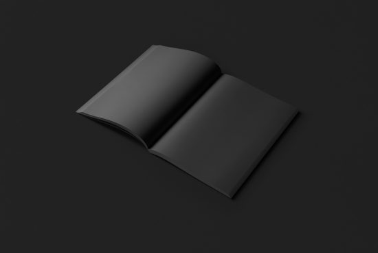 Open magazine mockup with blank black pages on a dark background suitable for design presentations and portfolio displays.