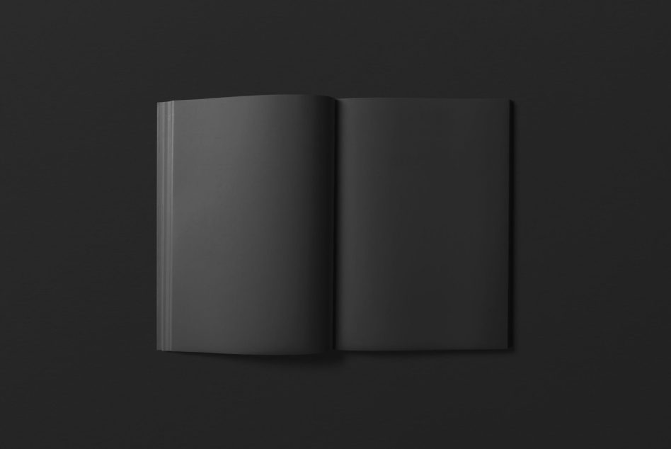 Black magazine mockup with open pages on dark background, isolated for design presentation and portfolio showcase.