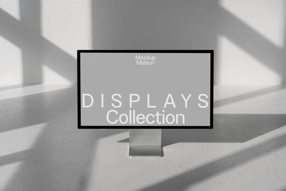 Monitor display on pedestal base with bright sunlight streaming across surface