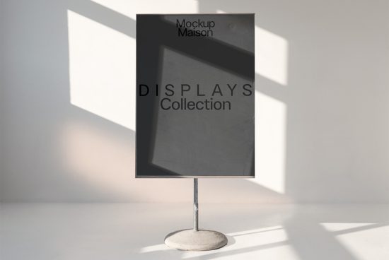 Minimalist poster mockup on metal stand with elegant shadow play, ideal for display design presentations for designers.