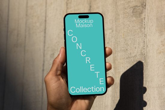 Hand holding smartphone mockup displaying "Concrete Collection" with concrete wall background for designers, app presentation, digital assets.