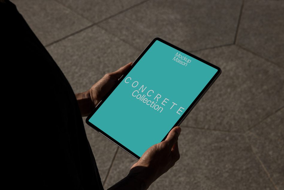 Hands holding tablet with turquoise screen displaying Concrete Collection branding mockup