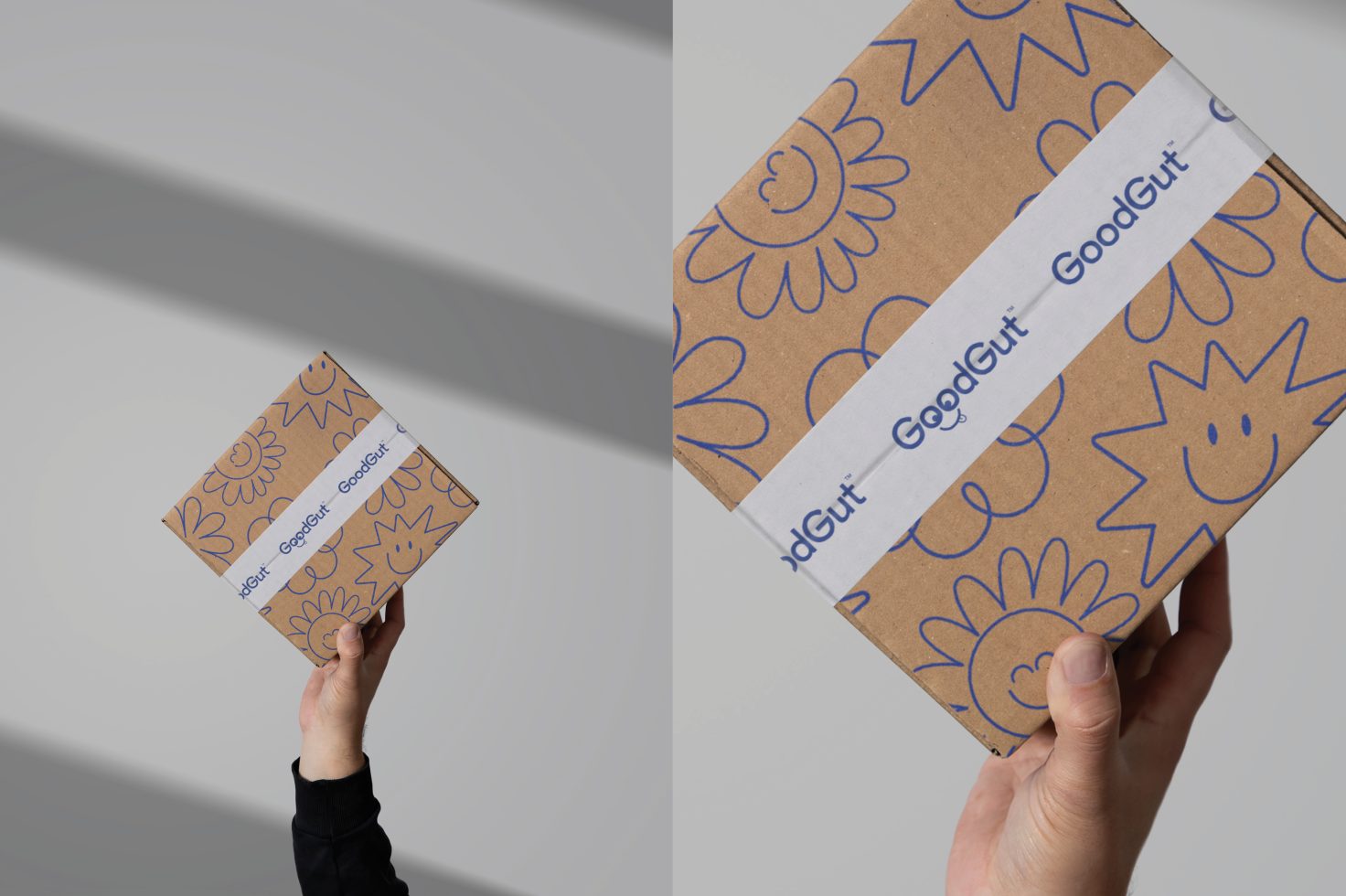 Hand holding a cardboard package with floral pattern and branded tape, mockup for packaging design, sun motifs, product presentation.