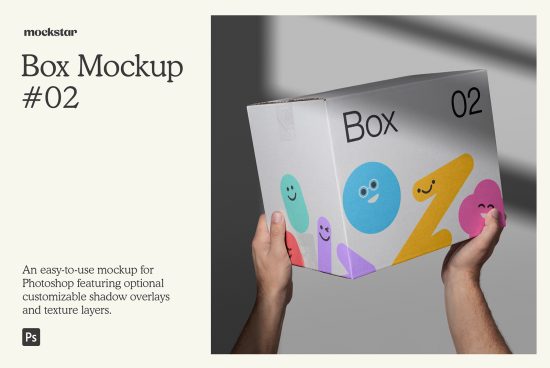 Hand holding a playful box mockup with colorful cartoon figures, ideal for packaging design, available as a customizable Photoshop file.