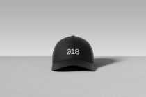 Solid black baseball cap with white 018 embroidery on crown, front view