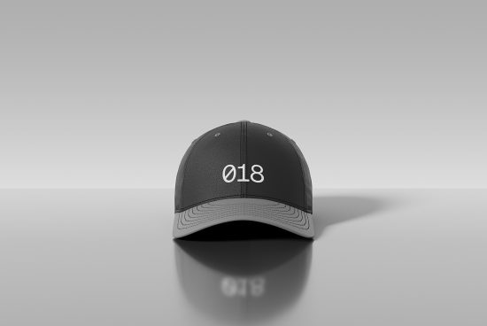 Black baseball cap mockup with white embroidered number on front, realistic fabric texture, adjustable strap, on reflective surface for designers.