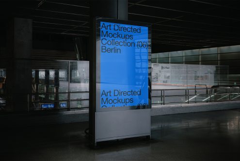 Digital billboard mockup in a modern urban setting with blue screen displaying Art Directed Mockups Collection 06 Berlin ideal for designers to showcase work.