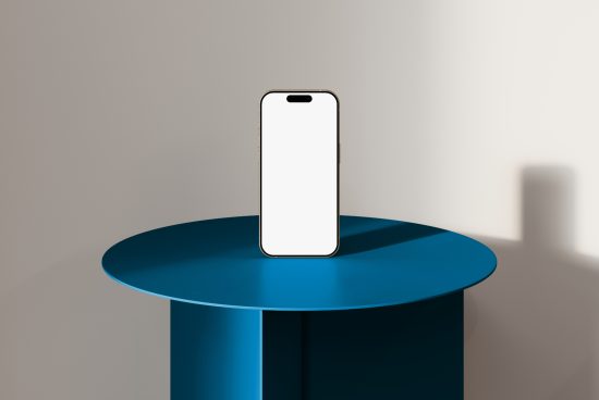 Mockup of a modern smartphone with a blank screen, standing on a blue circular table. Ideal for showcasing UI design, apps, mobile templates, and product presentations.
