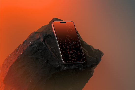 Phone mockup showcasing a smartphone on a black rock with a gradient orange background perfect for designers exploring tech and nature-themed presentations.