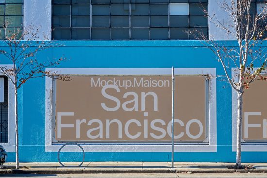 Urban storefront mockup with signage, San Francisco text, blue wall facade, window graphics for branding and design presentation.