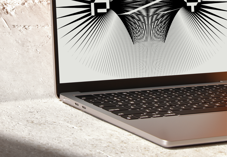 Laptop with a geometric design on screen. Perfect mockup for showcasing digital graphics, templates, or designs. Ideal for web designers and graphic artists.