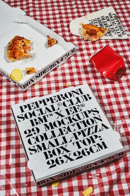 Pizza box mockup on checkered tablecloth with pepperoni slices. Ideal for presentation of branding in the food industry for designers. Digital asset.