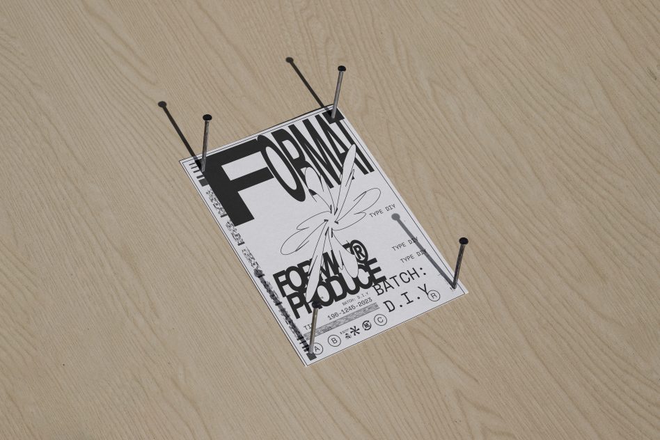 Graphic design mockup featuring a minimalist flyer with bold typography, secured on a wooden surface with metal nails. Suitable for showcasing design templates.