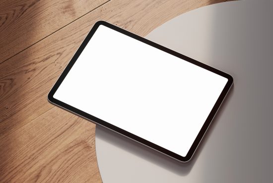 Tablet mockup lying on wooden and white surfaces, blank screen for design projects, ideal for UI UX designers, app presentation, digital illustration.