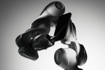 Black VR headset with blank dark screen on clean gray background