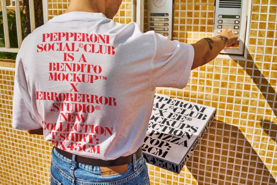 Man seen from the back wearing a mockup t-shirt and holding a pizza box. Ideal for digital assets in Mockups. Text on the shirt promotes mockup designs.