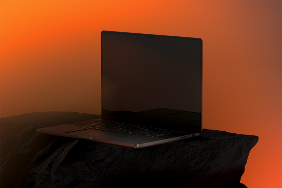 Laptop mockup on rocky surface with orange gradient background ideal for website designers and digital asset creators in graphics and templates categories
