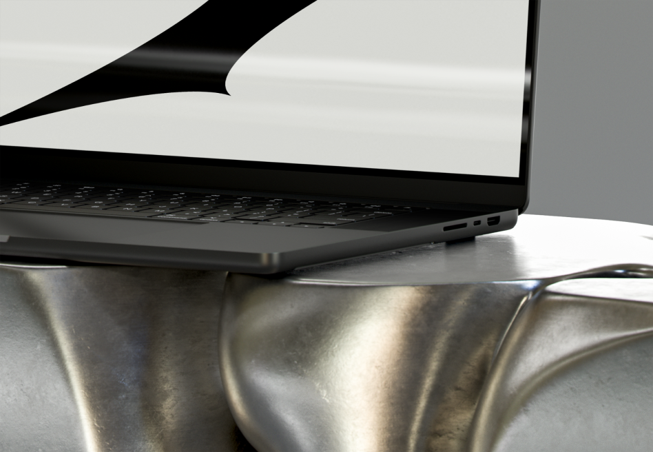 Close-up shot of a laptop keyboard with a black screen on a metallic table. Ideal for mockups, templates, tech design, and digital assets for designers.