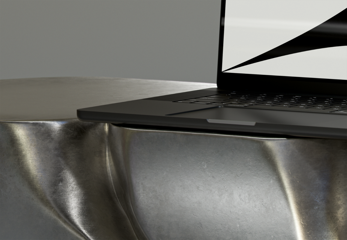 Close-up mockup of a sleek laptop on a metallic textured surface, ideal for graphic designers, templates, and mockups. Test different laptop screen designs easily.