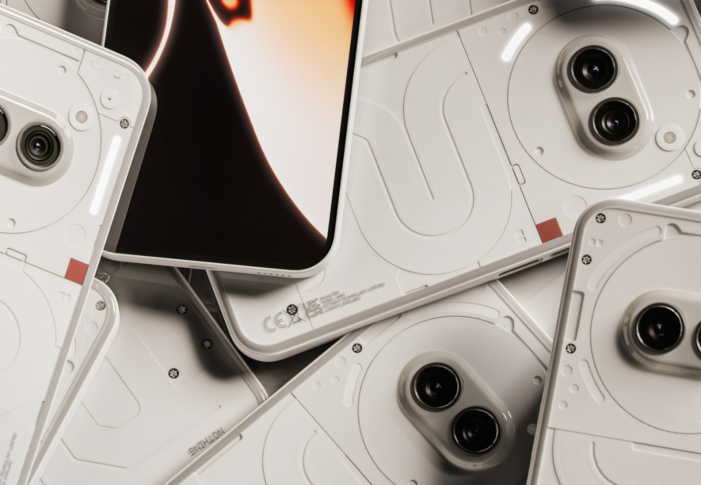 Close-up of multiple white smartphones featuring dual cameras and modern design. Ideal for mockups, templates, and graphic design projects for designers.